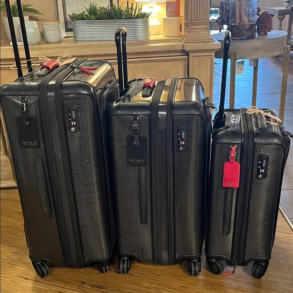 Tumi Carbon Fiber Luggage Set with Red Accents- set for extra savings. - Picture 2 of 3